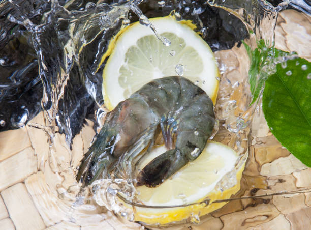 istock shrimp seafood splash on water with fresh lemon 678097822