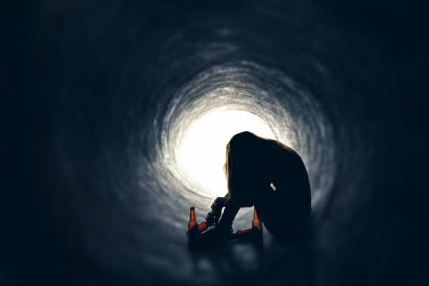 istock Alcoholic With Empty Beer Bottles In Tunnel 678113590