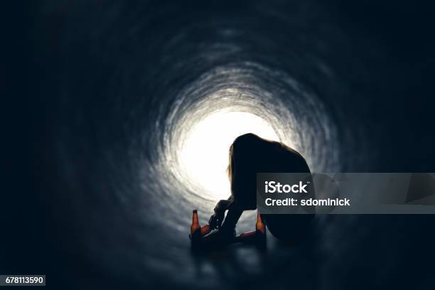 Alcoholic With Empty Beer Bottles In Tunnel Stock Photo - Download Image Now - Crying, Inside Of, Hangover