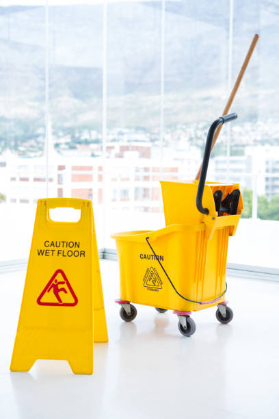 istock Sigh board and mop bucket in room 678129170
