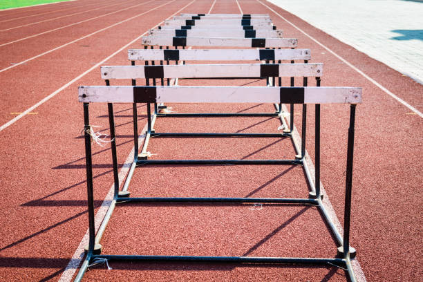 istock hurdle race on stadium track 678130162