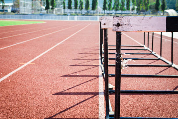 istock hurdle race on stadium track 678130490