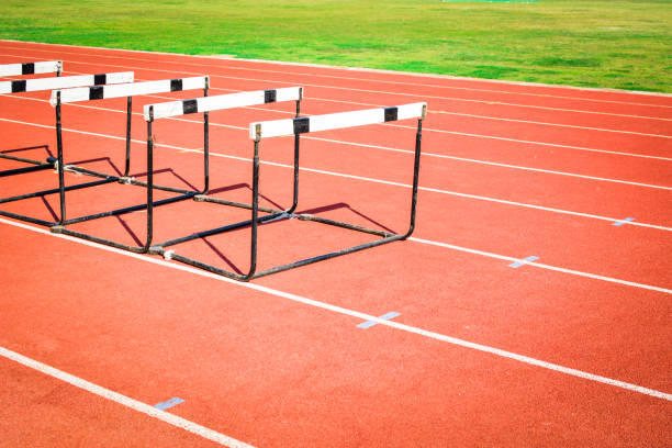istock hurdle race on stadium track 678131340