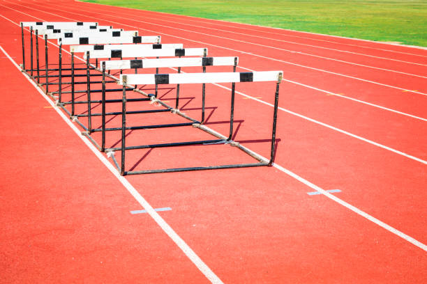 istock hurdle race on stadium track 678131670