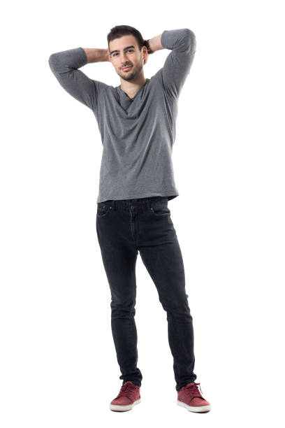 istock Handsome smiling fashion model posing with hands behind head 678140630