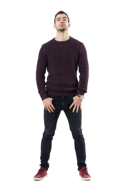 istock Conceited macho casual man with hands in pockets and head titled back. 678145408
