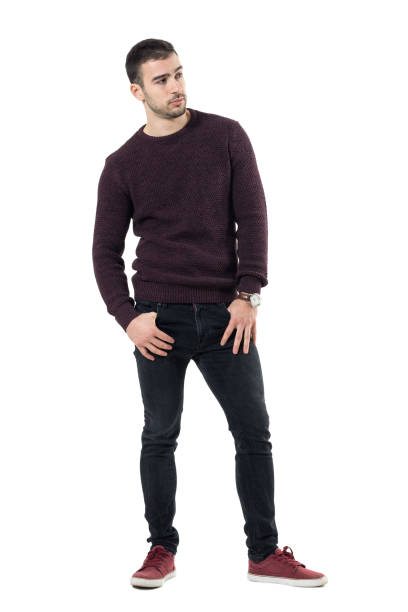 istock Serious confident macho casual man wearing maroon sweater looking away 678147178