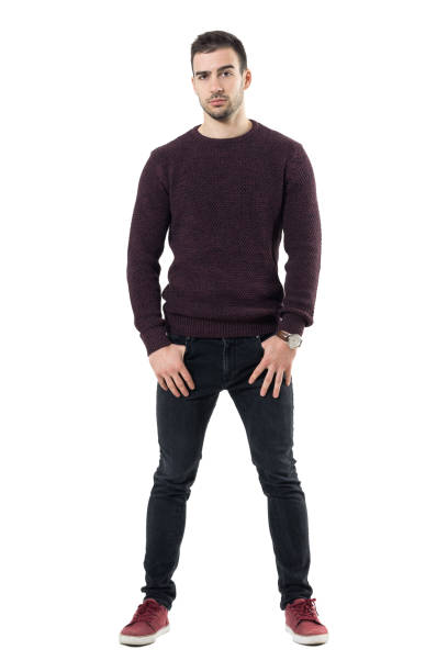 istock Serious confident tough casual man looking at camera with thumbs in pockets 678147230