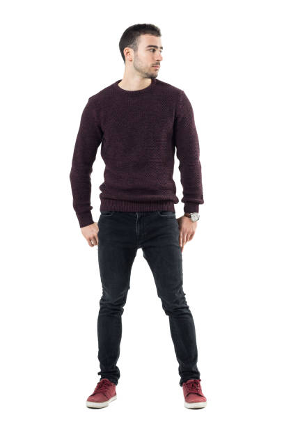 istock Handsome young sad casual man with hands in back pockets looking away 678147722