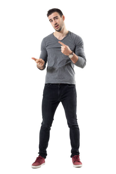 Expressive young casual man explaining and gesticulating with hands stock photo