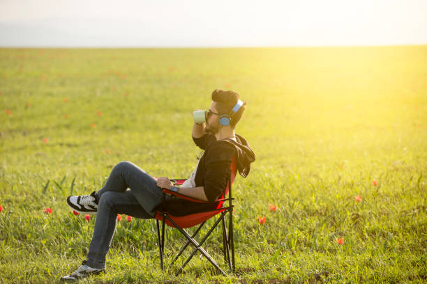 istock Young man having cup of coffee 678148630