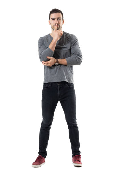 istock Funny young concentrated man watching and squinting eyes. 678151772