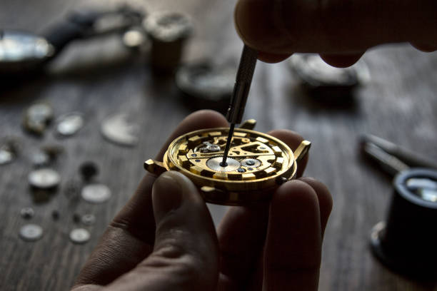 laboratorio orologiaio - watch maker work tool repairing watch foto e immagini stock