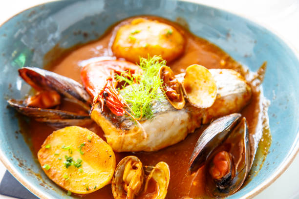 istock Fish stew with seafood in tomato sauce or bribes. 678170806