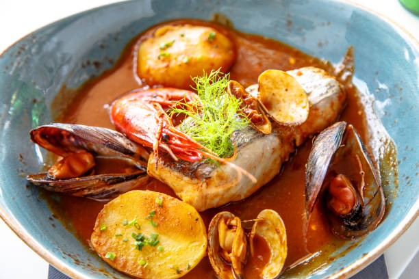 istock Fish stew with seafood in tomato sauce or bribes. 678170818