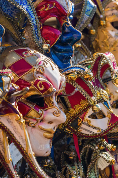 istock Venetian masks hanging at a rack 678177988