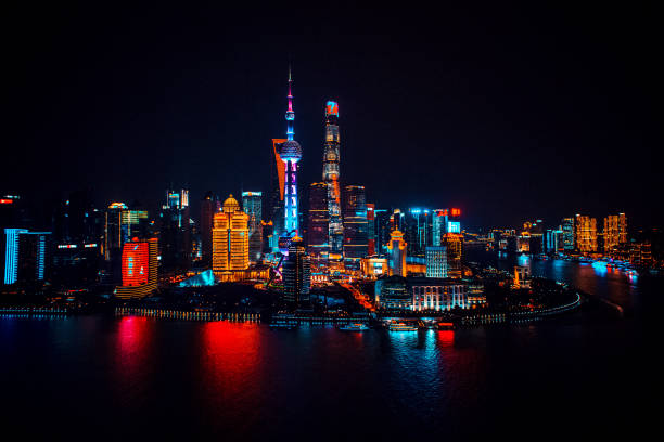Shanghai Night A rooftop view of Shanghai at night with all of the city lights on. shanghai tower stock pictures, royalty-free photos & images