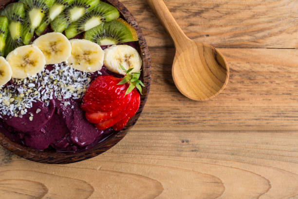 istock Acai bowl and wooden spoon 678183618