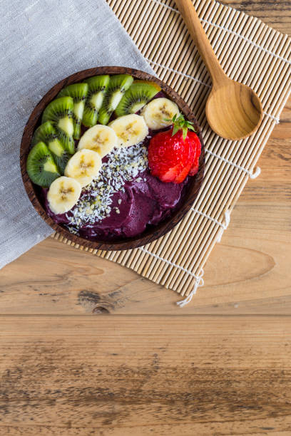 istock Acai bowl with napkin and spoon 678183826