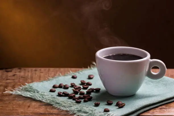 Photo of Cup of Coffee with Smoke