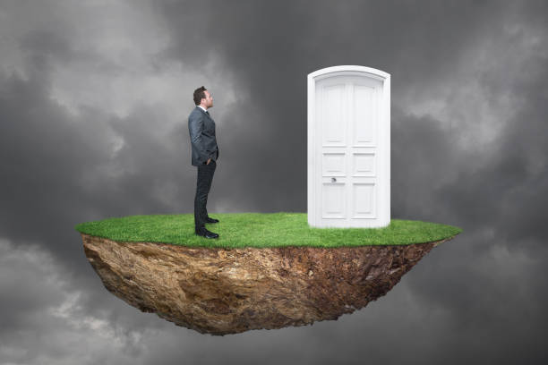 istock Businessman looking white door 678248304