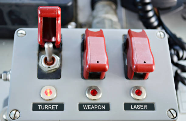 istock weapon control console toggle switches with red flip-top safety covers 678287190