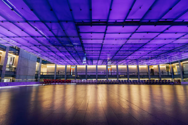 Living room with illuminated ceiling with colored acrylic panels