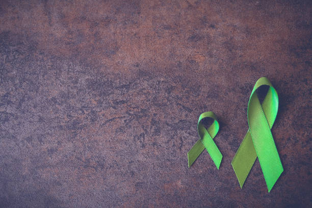 lime green ribbons ,lyme disease, mental health awareness - lyme disease imagens e fotografias de stock