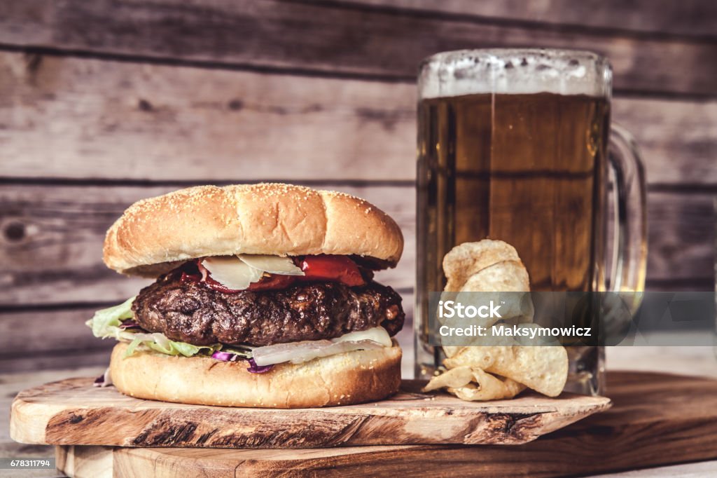 Craft Beer With Hamburger Craft Beer With HamburgerCraft Beer With Hamburger Burger Stock Photo