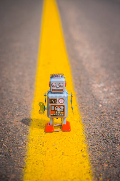 istock Retro robot on the road 678345318