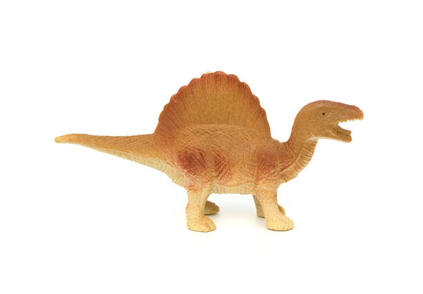 istock side view brown spinosaurus toy on a white background 678346344