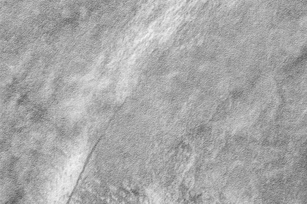 istock Closeup surface at stone pattern at stone brick wall in the garden textured background in black and white tone 678352188