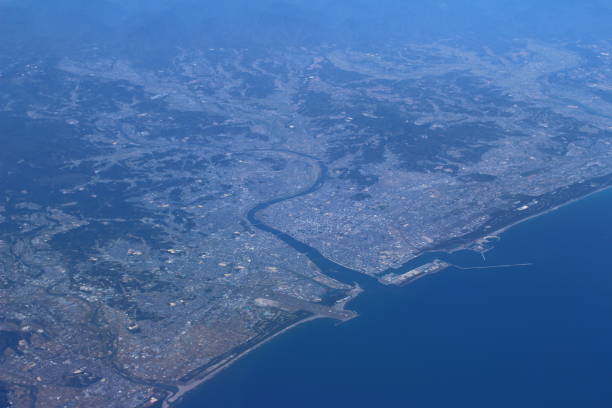 istock Aerial view fo city through airplane window 678353298