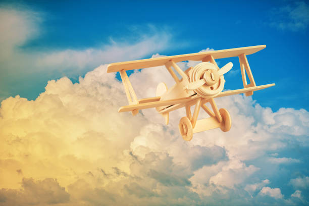 istock Wood airplane on the blue sky 678353988