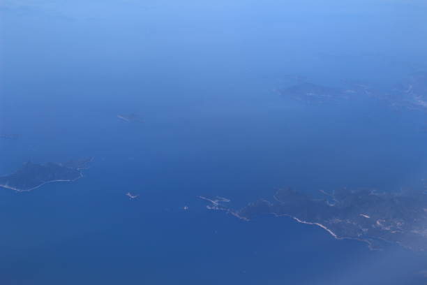 istock Aerial view fo city through airplane window 678355848