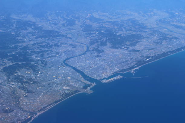 istock Aerial view fo city through airplane window 678368218