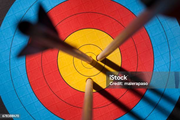 Three Arrows On An Archery Target Stock Photo - Download Image Now - Sports Target, Arrow - Bow and Arrow, Archery