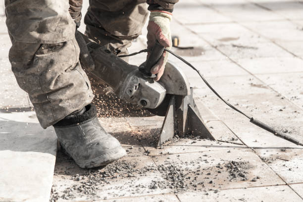istock Worker cuts metal in the park 678406504