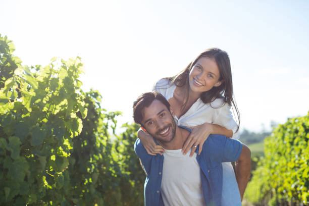 istock Happy young couple piggybacking during sunny day 678416688
