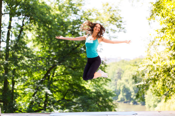 istock Woman doing exercise outdoors. 678421176