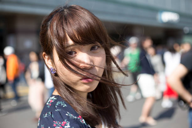 istock Cute woman walking in the city 678422764