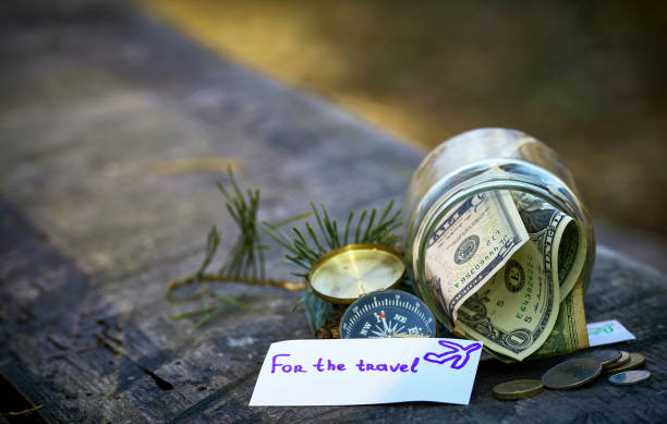 istock Piggy bank with money to make a dream come true. 678433762