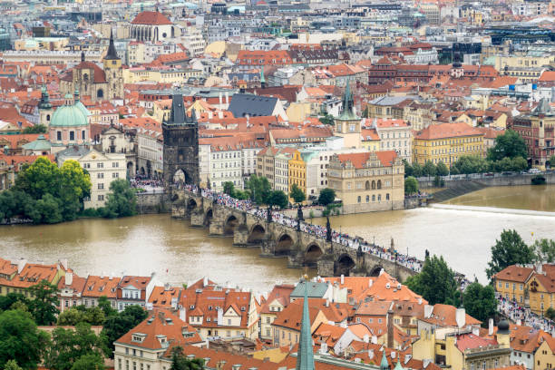 istock Many Tourists on the Charles Bridge in Prague 678444584