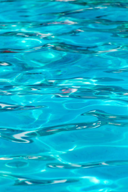 istock The smooth water in the pool as a background 678447582