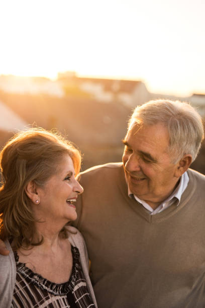 istock Loving mature couple talking to each other at sunset. 678462496