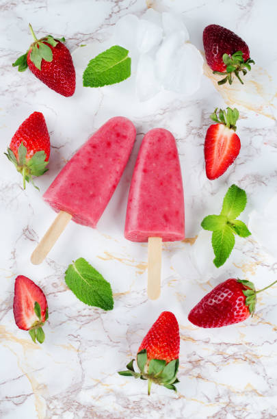 istock Strawberry banana ice cream with mint and strawberries 678464284