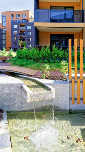 istock Fountain at Modern complex of residential building 678475976