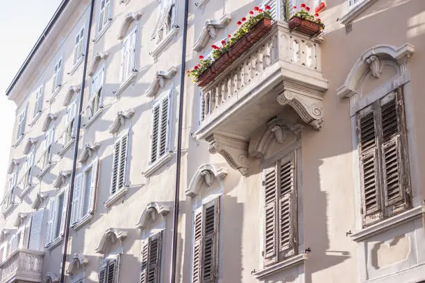 Photo of facade of Italian building beautiful balcony