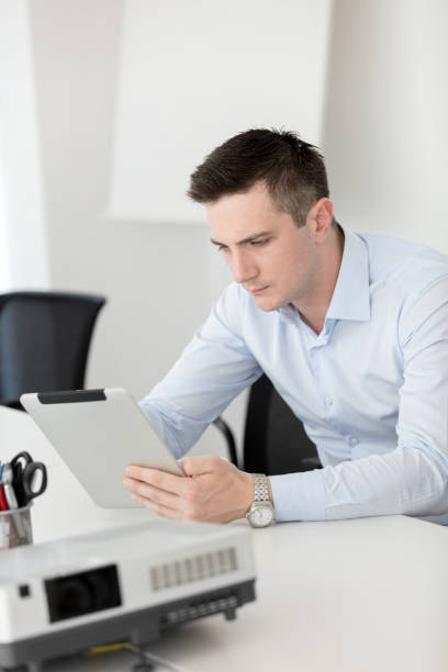 istock Businessman reviewing financial data 678485722