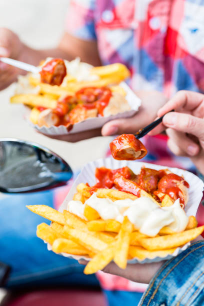 istock Currywurst and french fries on scooter 678486624